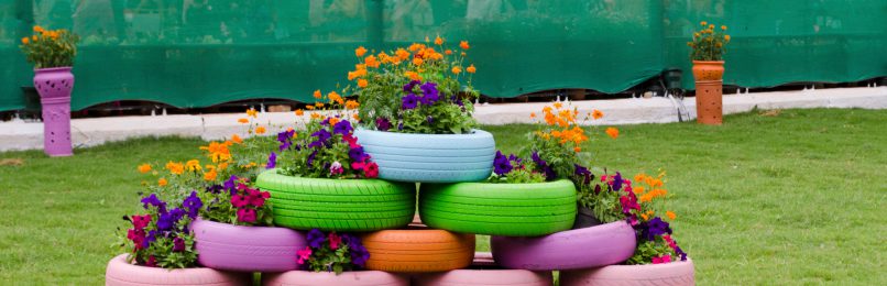 Sind als Pflanzenringe verwendete Altreifen Abfall? Blumenkunst