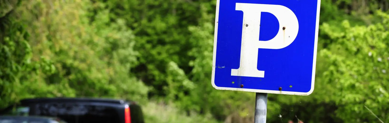 Stellt das Anbringen privater Parkkrallen eine Erpressung dar? Bordellparkplatz