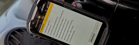 Darf Paketauslieferungsfahrer einen Scanner während der Fahrt bedienen?