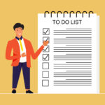 Mann steht neben einer Todo-Liste