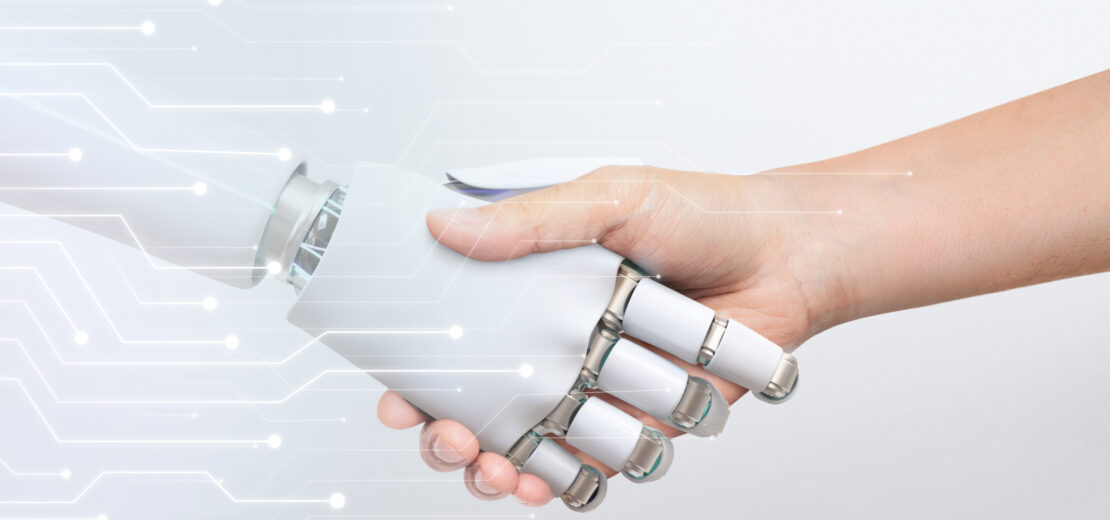 Handschlag Roboter und Mensch