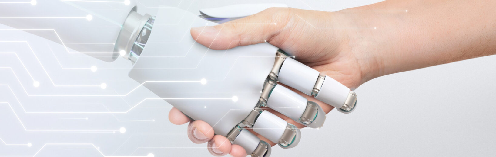 Handschlag Roboter und Mensch