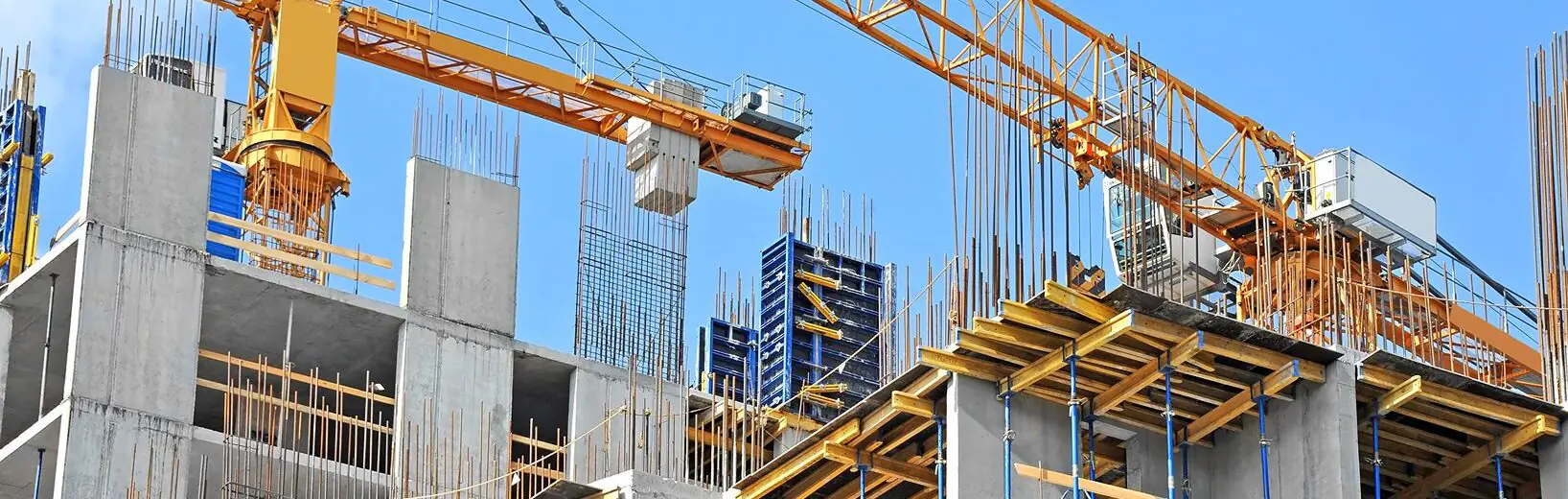Städtebaulicher Vertrag: Rechtsgrundlage für Planung, Umsetzung und Landesrecht Bau zweier Gebäude, im Hintergrund zwei Kräne.
